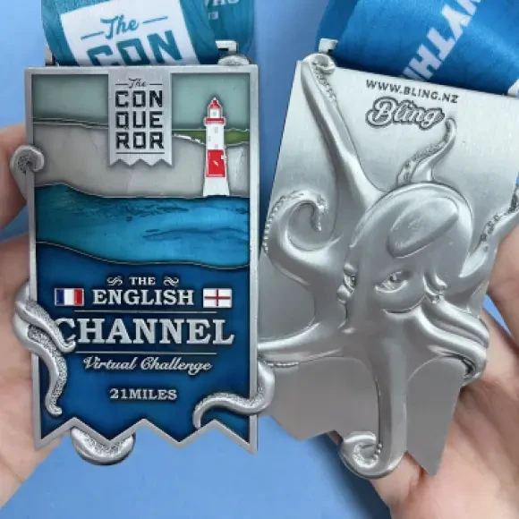 English Channel medal held in hand